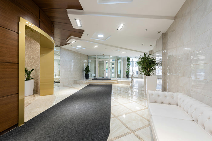 Hotel lobby reception with marble surfaces